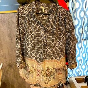 Medium Live 4 Truth blouse with elephant details.